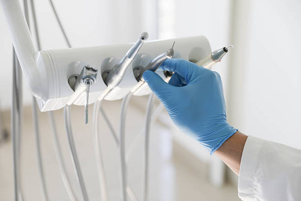 Professional Emergency Dentist technician working in Russell County County, KS